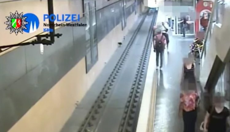 hombre arroja a desconocido a las vias