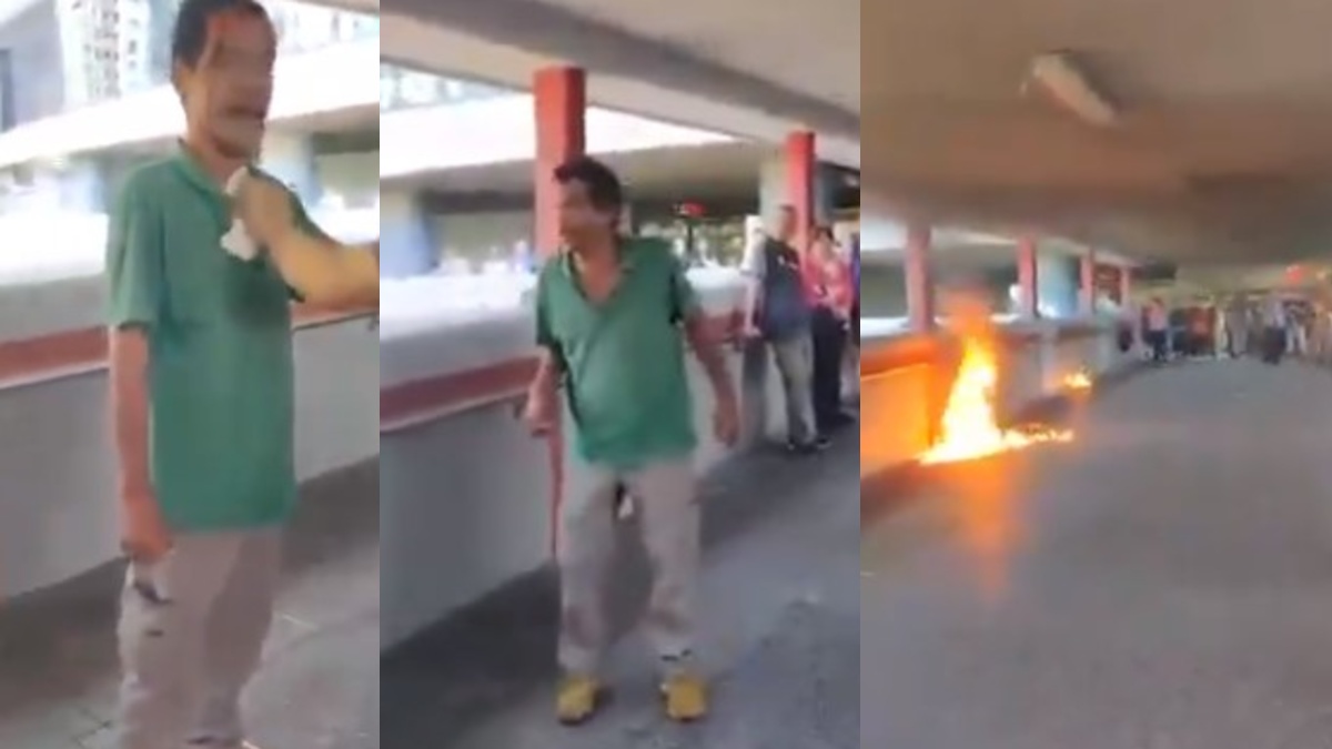 manifestantes fuego hombre